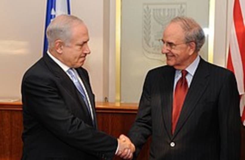 Netanyahu mitchell firm handshake 248.88 (photo credit: GPO)