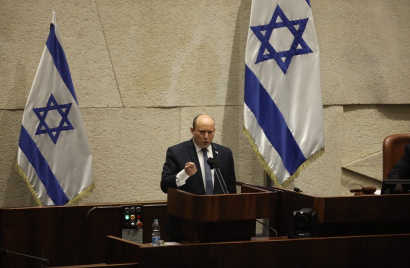 Prime Minister Naftali Bennett in the Knesset plenum, February 7, 2022. (photo credit: MARC ISRAEL SELLEM/THE JERUSALEM POST)