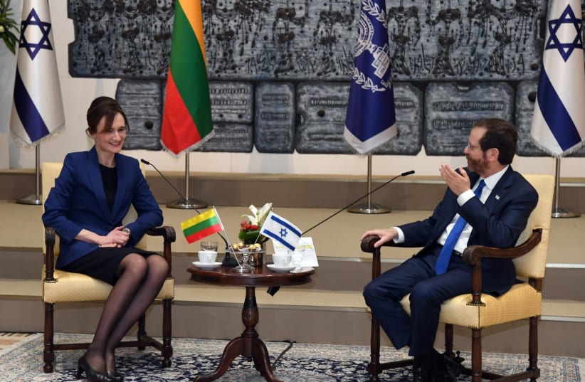  Lithuanian parliament speaker Viktorija Cmilyte-Nielsen and Israeli president Isaac Herzog. (photo credit: HAIM ZACH/GPO)