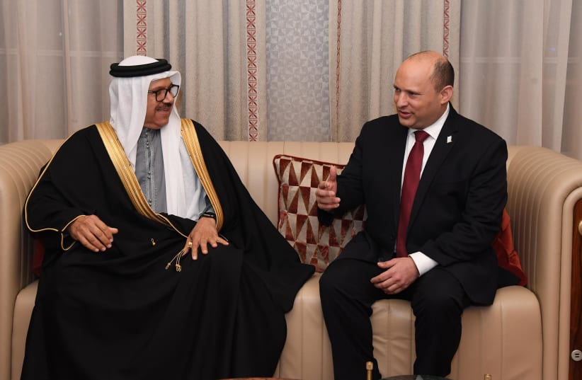  Israeli Prime Minister Naftali Bennett is seen meeting with Bahraini officials in Manama, after being the first Israeli prime minister in the Gulf Arab state, on February 14, 2022. (photo credit: HAIM ZACH/GPO)