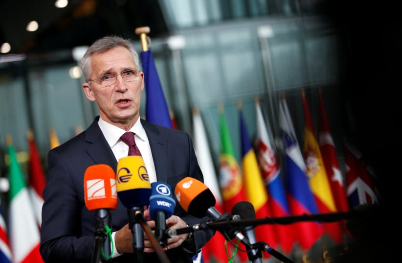  NATO Secretary-General Jens Stoltenberg speaks ahead of a NATO Defence Ministers meeting in Brussels, Belgium, February 16, 2022.  (photo credit: JOHANNA GERON/REUTERS)