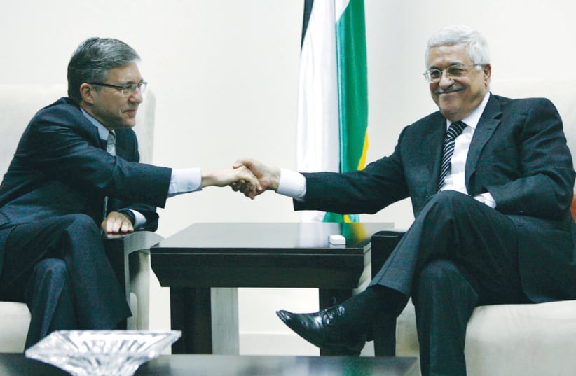  THEN-MK Yossi Beilin meets with Palestinian Authority leader Mahmoud Abbas in Ramallah in 2007. (photo credit: Loay Abu Haykel/Reuters)