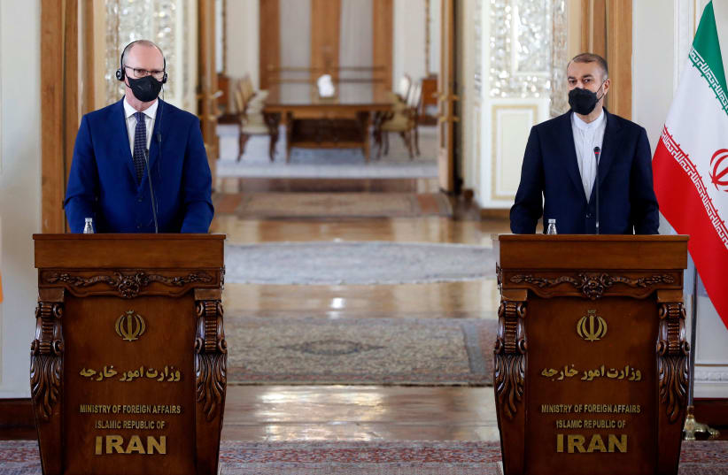  Irish Foreign and Defence Minister Simon Coveney speaks during a joint press conference with Iranian Foreign Minister Hossein Amir-Abdollahian in Tehran on February 14, 2022.  (photo credit: STR/AFP via Getty Images)