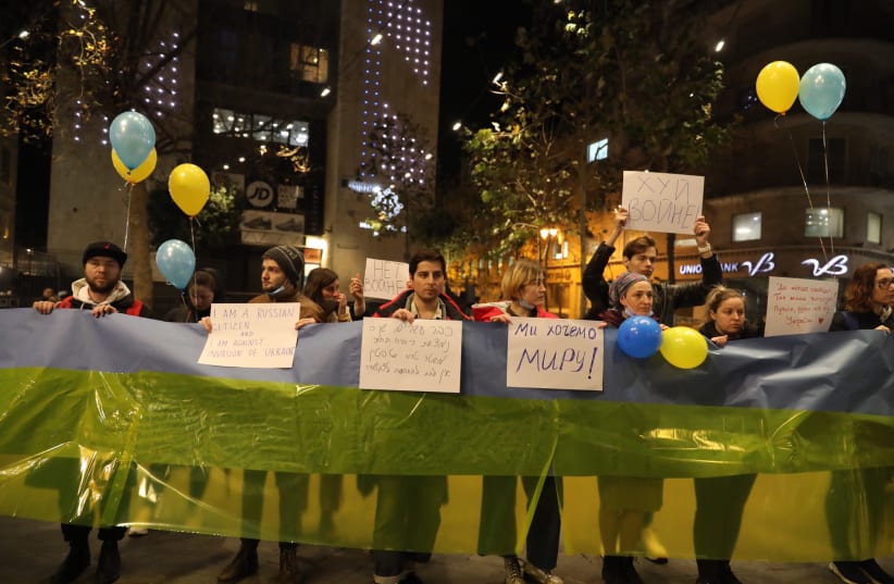  Israelis protest the Russian invasion of Ukraine at Zion Square February 24, 2022. (photo credit: MARC ISRAEL SELLEM/THE JERUSALEM POST)