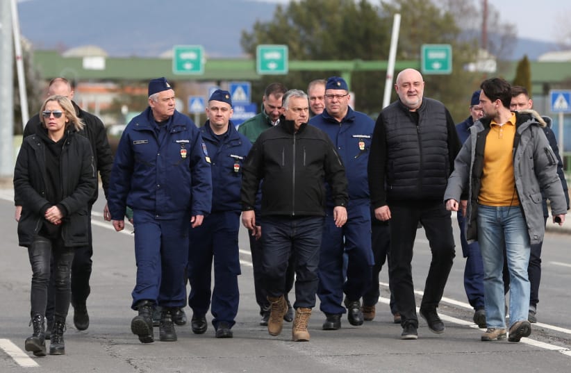 vHungarian Prime Minister Viktor Orban visits the Ukraine-Hungary border where people cross into the country to flee the Russian massive military operation against Ukraine, in Beregsurany, Hungary, February 26, 2022. (photo credit: REUTERS/BERNADETT SZABO)