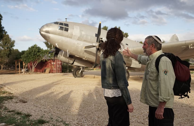 Visitors marvel at a restored C46 airplane that was used to secretly bring Jews from Iraq to Israel in the 1940s (photo credit: JNF-USA)