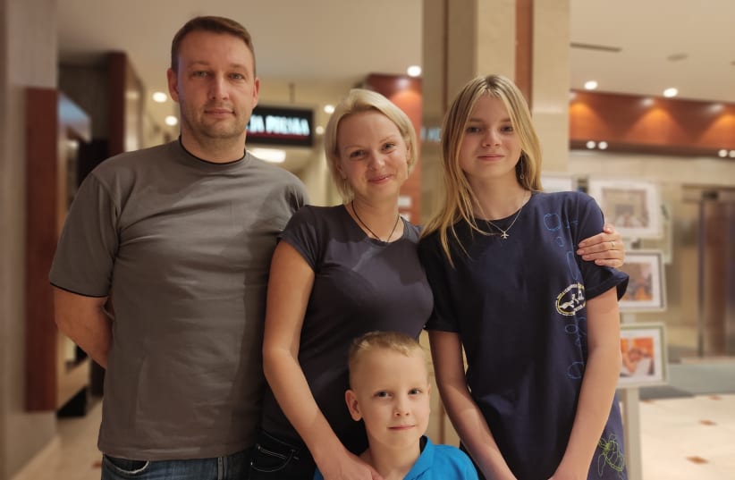  Natalia and Andre Forys and their children Arina, 12, and Max, six, who escaped the fighting in Ukraine, February 28, 2022. (photo credit: Zvika Klein)