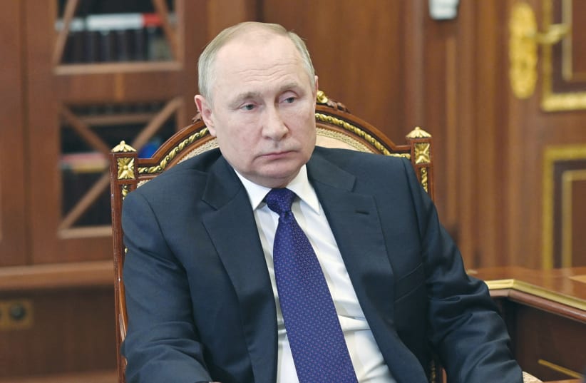  RUSSIAN PRESIDENT Vladimir Putin attends a meeting in Moscow on Tuesday. (photo credit: Sputnik/Kremlin/Reuters)