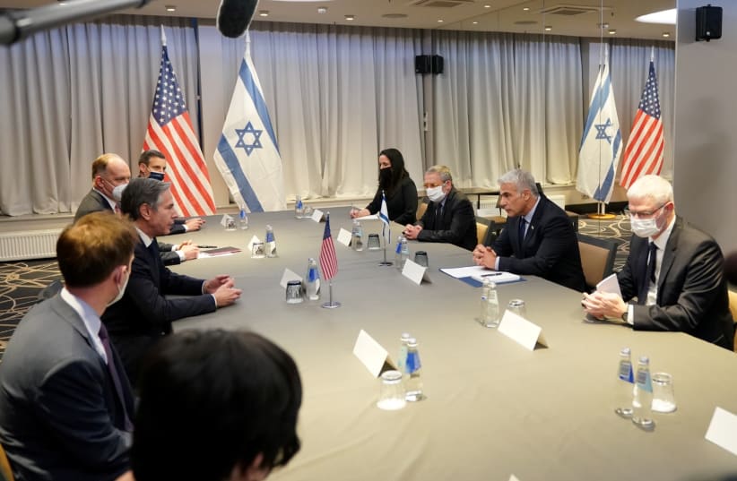 American and Israeli delegations during Foreign Minister Yair Lapid and US Secretary of State Antony Blinken's meeting in Riga, Latvia, on March 7, 2022 (photo credit: EDITS PALENS)