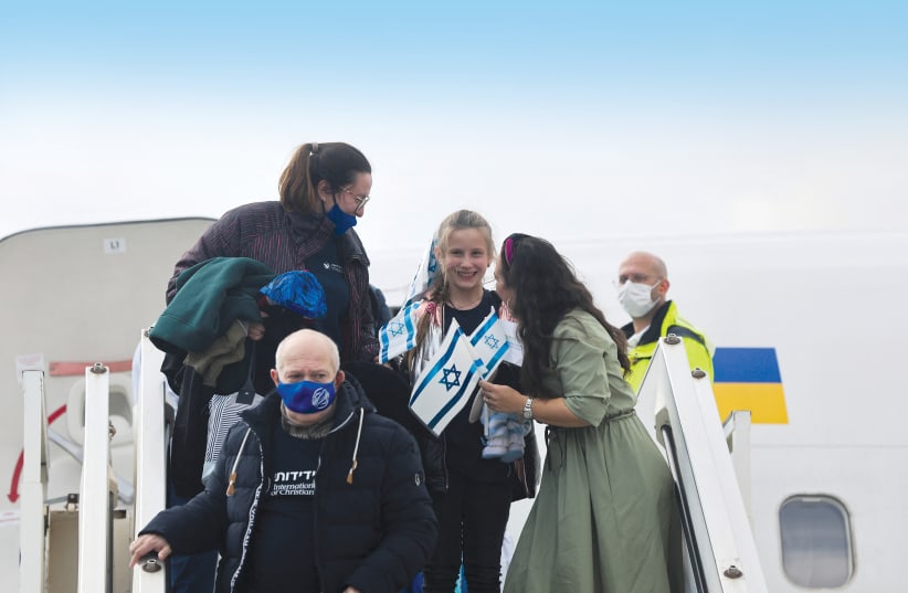  New immigrants are seen arriving in Israel after fleeing Ukraine. (photo credit: NIR ELIAS/REUTERS)