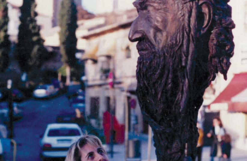  Rosa Hidalgo with the sculpture. (photo credit: ROSA HIDALGO)