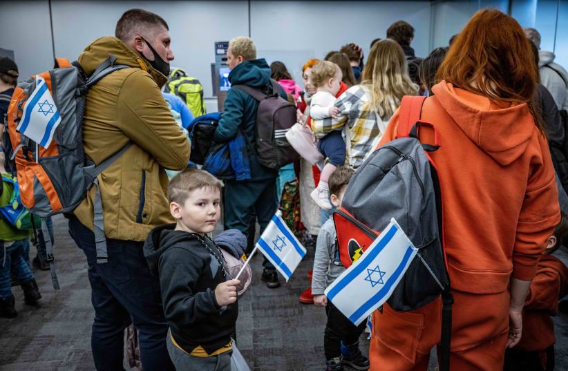  Jewish immigrants fleeing the war in Ukraine, on a rescue flight sponsored by the IFCJ, arrive at Ben-Gurion Airport near Tel Aviv, March 6, 2022. (photo credit: NATI SHOHAT/FLASH90)