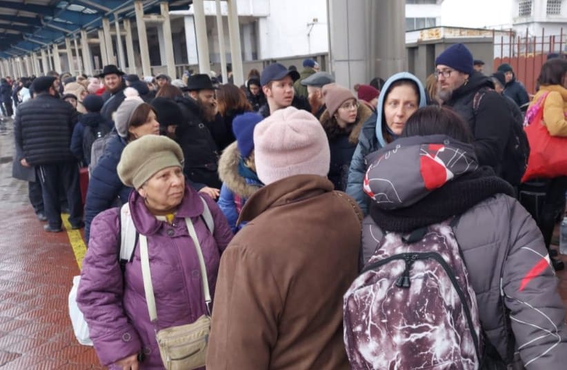  Ukraine refugees wait at stations close to the border (photo credit: AY Moldova)