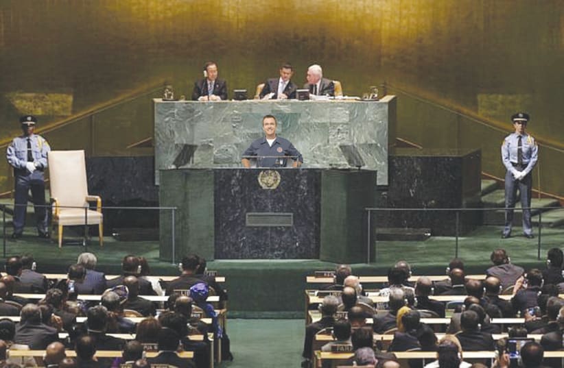  Moti Cohen having a great time addressing the UN General Assembly on Israel’s behalf. (photo credit: RotoReuters)