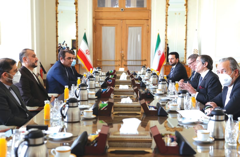  IRANIAN FOREIGN Minister Hossein Amir-Abdollahian (2nd-L) meets with head of the International Atomic Energy Agency Rafael Grossi (2nd-R) in Tehran on March 5. (photo credit: Atta Kenare/AFP via Getty Images)