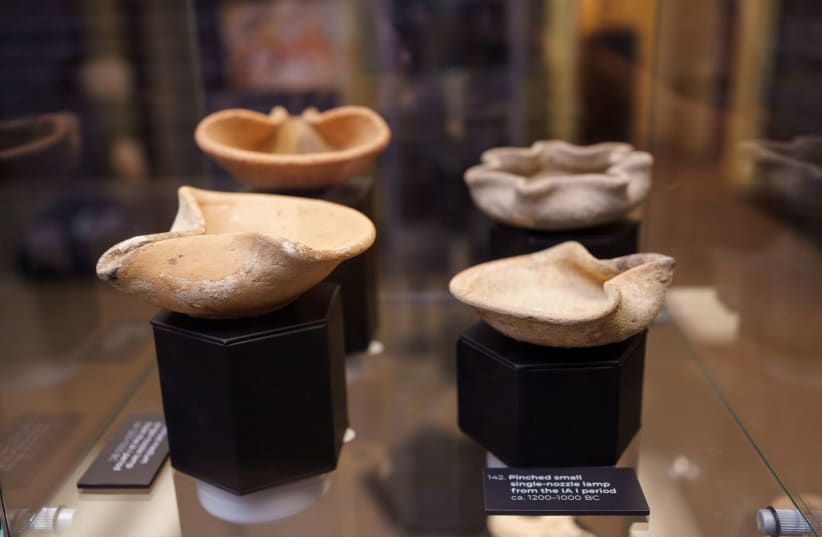 The Texas museum highlights the evolution of lamps utilized through biblical eras (photo credit: MIKE TURNER)