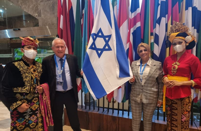   MKs Avi Dichter and Nira Shpak greeted at the International Parliamentary Union conference in Indonesia, March 21, 2022.  (photo credit: LIAT MARGALIT)