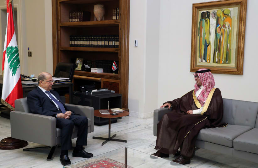  Lebanon's President Michel Aoun meets with Saudi Ambassador to Lebanon Walid bin Abdullah Bukhari at the presidential palace in Baabda, Lebanon March 23, 2021 (photo credit: DALATI NOHRA/HANDOUT VIA REUTERS)