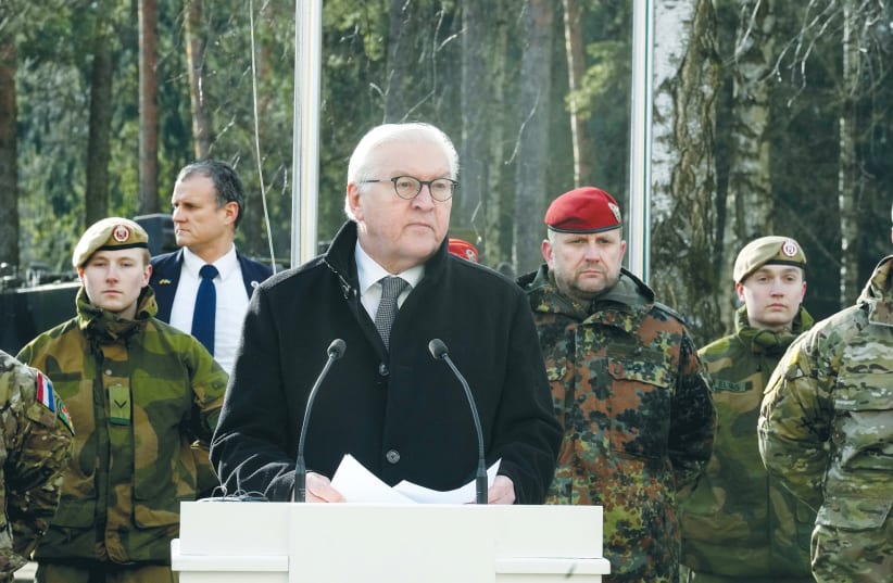  GERMAN PRESIDENT Frank-Walter Steinmeier speaks at Rukla military base in Lithuania earlier this month. Germany has expressed its intention to restore its military power. (photo credit: Ints Kalnins/Reuters)