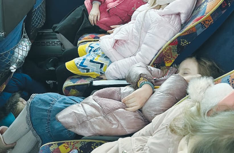  THE AUTHOR’S children in transit as the family escapes Kharkiv. Looking back it was truly miraculous that we found our way.  (photo credit: Chani Moskowitz)