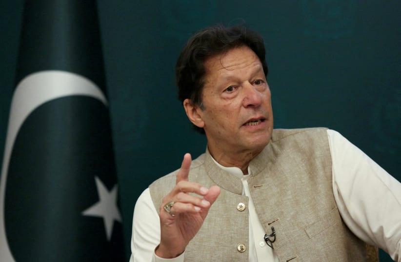  Pakistani Prime Minister Imran Khan speaks during an interview with Reuters in Islamabad, Pakistan June 4, 2021 (photo credit: Saiyna Bashir/REUTERS)