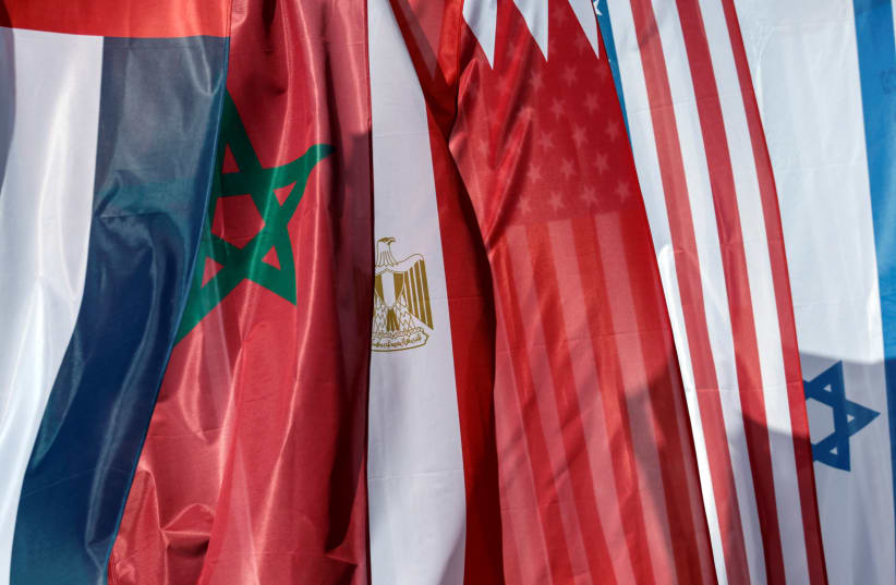  Flags are seen ahead of "The Negev Summit", hosted by Israel's Foreign Minister Yair Lapid and attended by U.S. Secretary of State Antony Blinken, and the foreign ministers of the UAE, Bahrain, Morocco and Egypt, in Sde Boker, Israel, March 27, 2022. (photo credit: REUTERS/AMIR COHEN)