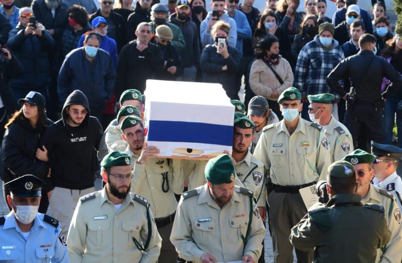  Border Police officers carry the coffin of their comrade Shirel Aboukrat, who was killed in a terror attack in Hadera on March 27, 2022. (photo credit: AVSHALOM SASSONI/MAARIV)