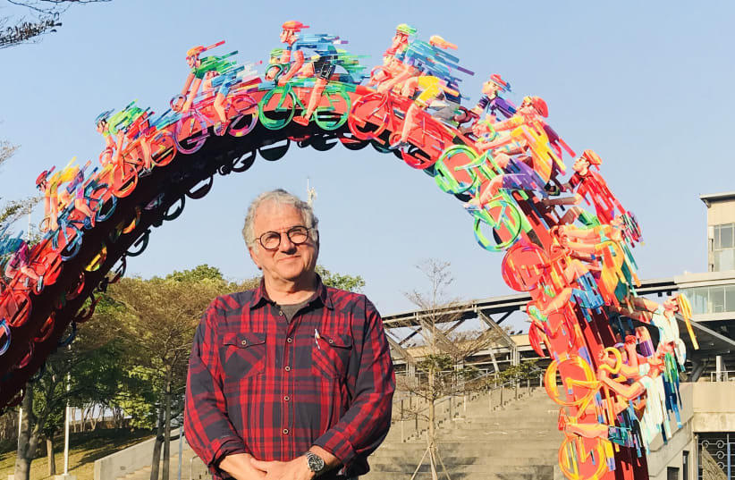  David Gerstein visits his Peloton Wave sculpture outside the sports stadium in Hsinchu, Taiwan, in 2019. (photo credit: DAVID GERSTEIN)