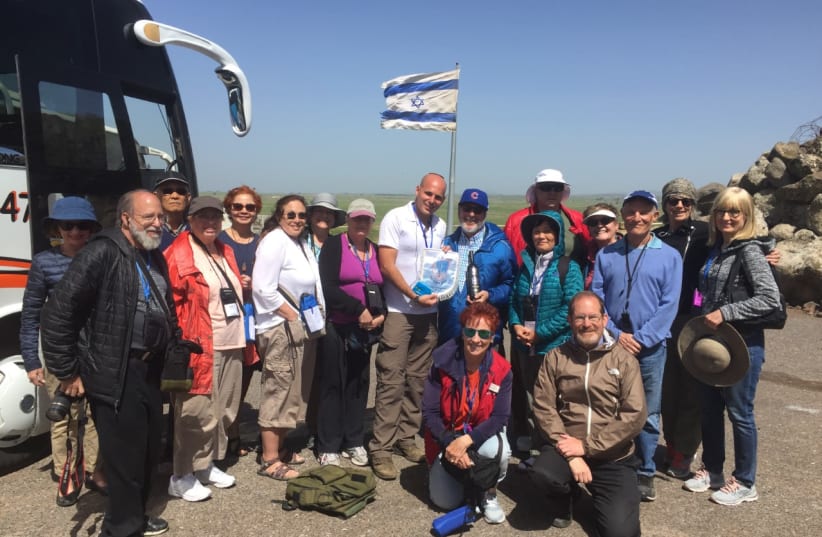  Yossi Yeinan with a group he is guiding. (photo credit: COURTESY YOSSI YEINAN)