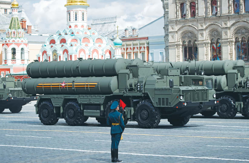  RUSSIAN S-400 ANTI-AIRCRAFT missile systems drive by during a rehearsal for the Victory Day parade in Moscow.  (photo credit: MAXIM SHEMETOV/REUTERS)