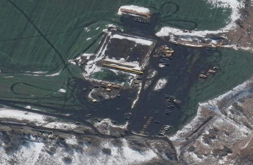  A satellite image shows Russian forces deployed in the western outskirts of Belgorod, Russia February 24, 2022. (photo credit: Courtesy of Satellite image 2022 Maxar Technologies/Handout via REUTERS)