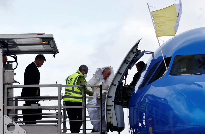  Pope Francis arrives to board a plane for his visit to Malta, at Leonardo da Vinci-Fiumicino Airport in Rome, Italy, April 2, 2022. (photo credit: Yara Nardi/Reuters)