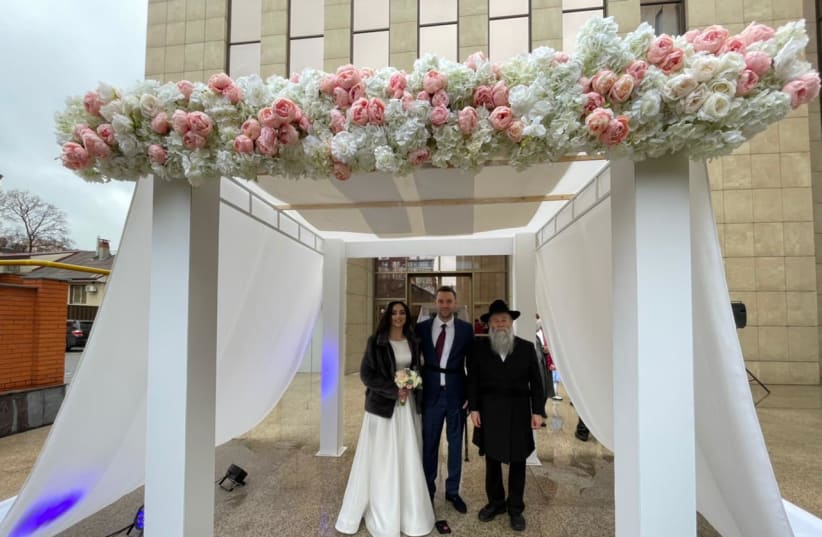  Alexander Tolkach and Tatiana Gvinyashvili are the first Jewish couple to get married since the war in Ukraine began. (photo credit: Jewish Federation of Ukraine)