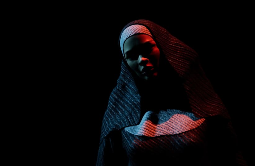  Nun in the dark (illustrative) (photo credit: INGIMAGE)