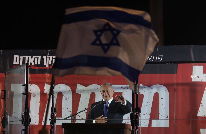  Opposition leader Benjamin Netanyahu speaks at a rally in Jerusalem, April 6, 2022 (photo credit: MARC ISRAEL SELLEM)