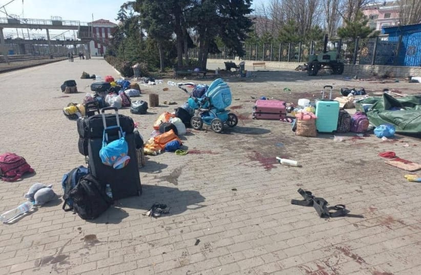  A view of people's belongings and bloodstains on the ground after a missile strike on a railway station in Kramatorsk, Ukraine, in this picture uploaded on April 8, 2022 and obtained from social media. (photo credit: Ministry of Defence Ukraine/via REUTERS)