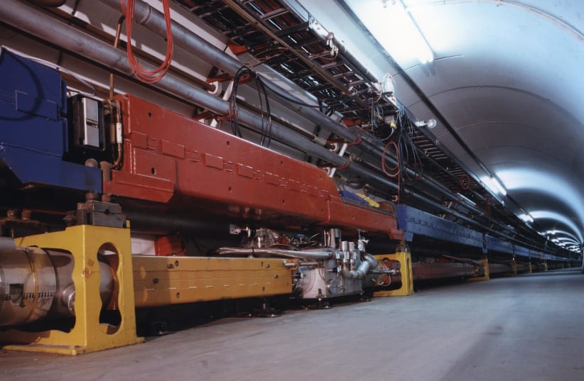  Fermi Lab's main accelerator tunnel, showing original ring (above) and Tevatron's superconducting magnets (below) (photo credit: US Department of Energy)