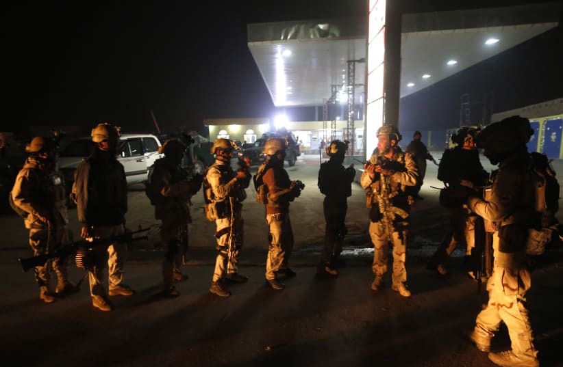  Afghan security forces arrive at the site of a Taliban assault in Kabul November 19, 2014. (photo credit: REUTERS/ Omar Sobhani)