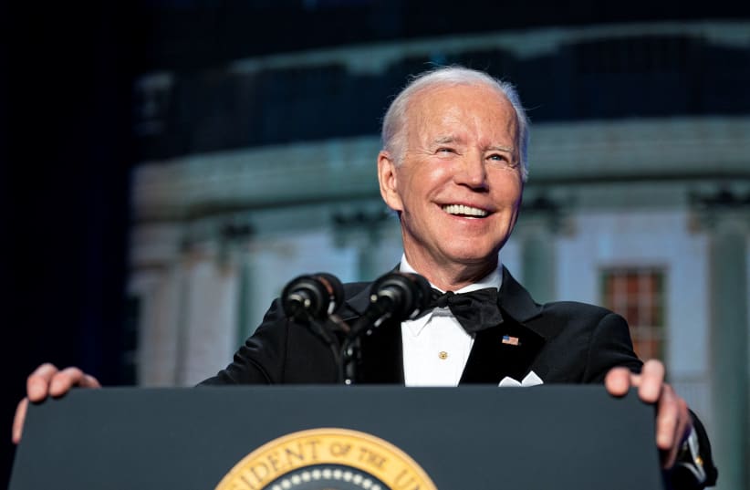 US President Joe Biden addresses the annual White House Correspondents Association Dinner in Washington, U.S., April 30, 2022.  (photo credit: REUTERS/Al Drago)