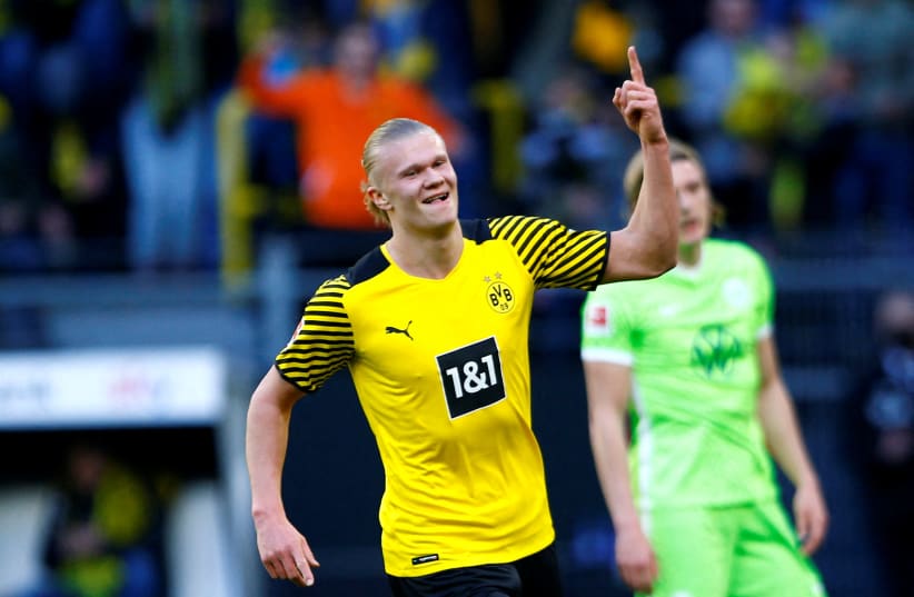  Borussia Dortmund's Erling Braut Haaland celebrates their second goal scored by Axel Witsel on April 16, 2022. (photo credit: REUTERS/THILO SCHMUELGEN)