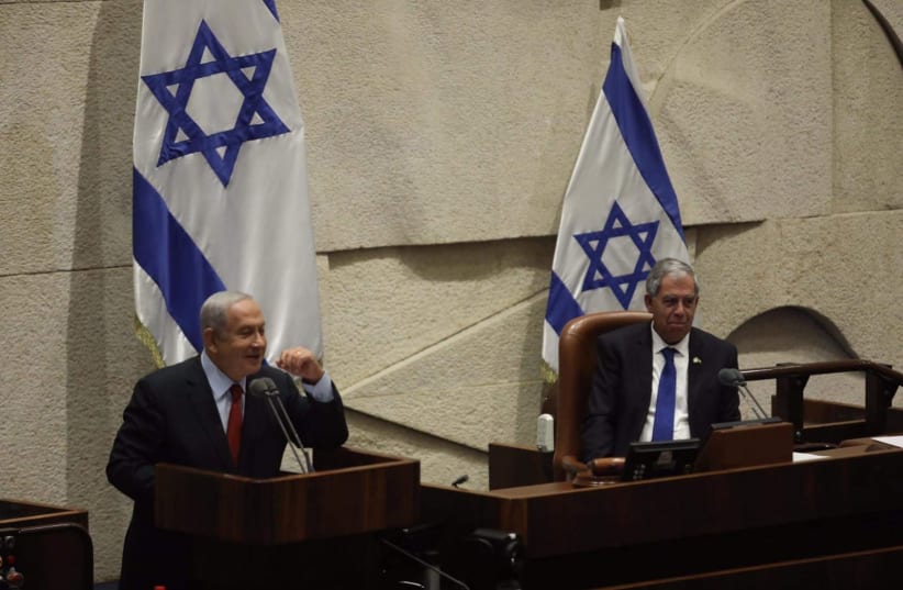  Opposition leader Benjamin Netanyahu (L) is seen gesturing alongside Knesset Speaker Mickey Levy at the Knesset plenum in Jerusalem, on May 9. 2022. (photo credit: MARC ISRAEL SELLEM/THE JERUSALEM POST)
