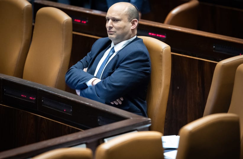 Israeli Prime Minister Naftali Bennett in the opening of the Knesset summer session at the assembly hall of the Knesset, the Israeli parliament in Jerusalem on May 9, 2022.  (photo credit: YONATAN SINDEL/FLASH90)