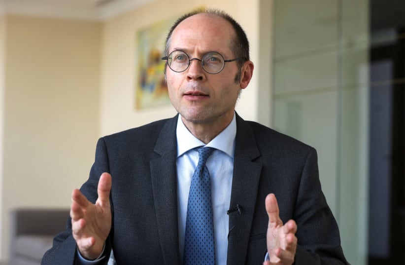  Olivier De Schutter, UN special rapporteur on extreme poverty and human rights gestures during an interview with Reuters, in Beirut, Lebanon November 11, 2021. Picture taken November 11, 2021. (photo credit:  REUTERS/Mohamed Azakir)
