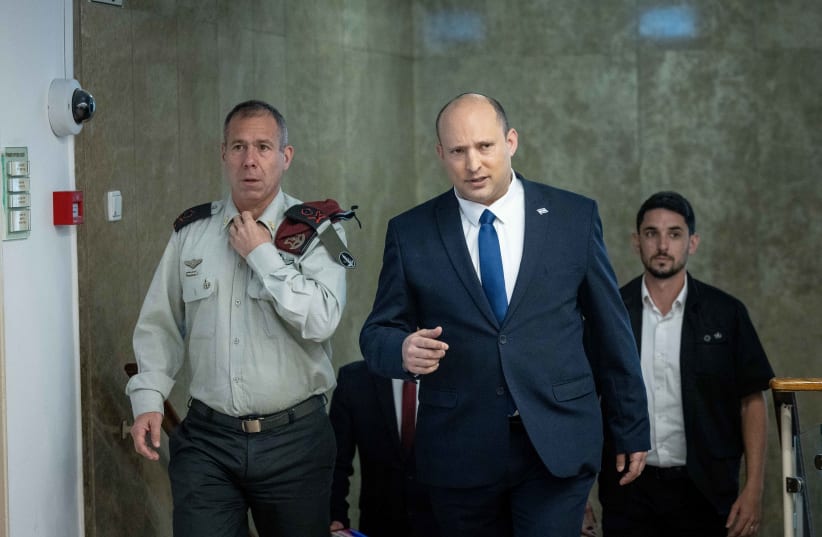 Prime Minister Naftali Bennett arrives to a cabinet meeting at the Prime Minister's Office in Jerusalem on May 15, 2022.  (photo credit: YONATAN SINDEL/FLASH90)