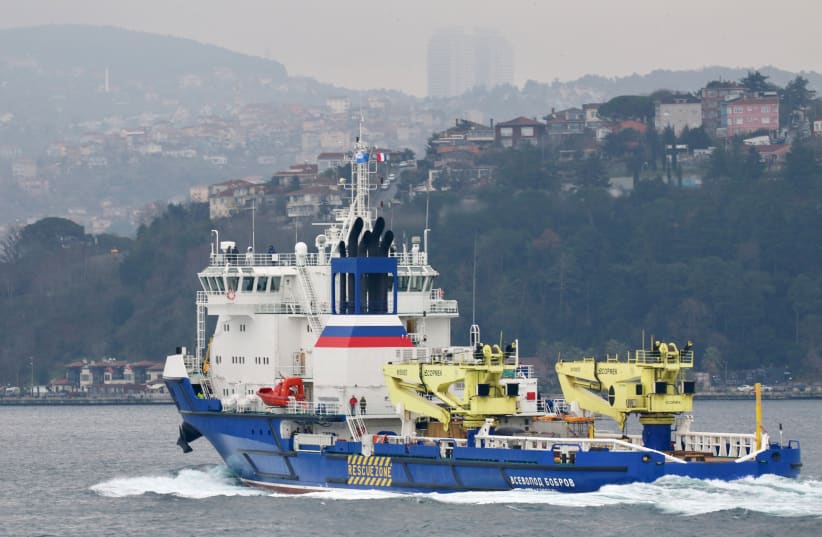Russian Navy's Black Sea Fleet logistics support ship Vsevolod Bobrov sails in the Bosphorus in Istanbul, Turkey, January 7, 2022. (photo credit: REUTERS/YORUK ISIK)