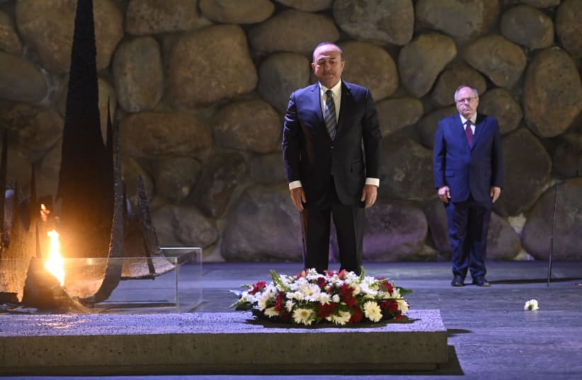  Turkish Foreign Minister Mevlüt Çavuşoğlu attends a memorial ceremony for Holocaust victims at Yad Vashem. (photo credit: JORGE NOVOMINSKY/YAD VASHEM)