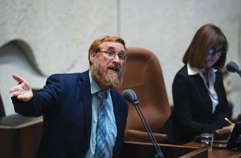  THEN SERVING as a Likud MK, the writer addresses the plenum in 2018. Reciting verses or prostrating oneself at a holy site does not endanger anyone, he writes. (photo credit: YONATAN SINDEL/FLASH90)