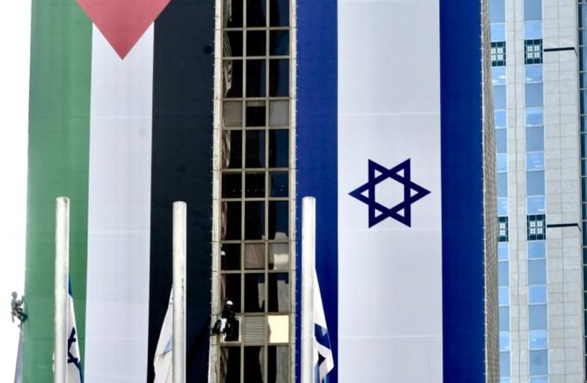  Palestinian and Israeli flags raised in Ramat Gan (photo credit: AVSHALOM SASSONI/MAARIV)