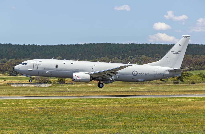 Royal Australian Air Force (A47-010) Boeing P-8A Poseidon conducting a touch-and-go at Canberra Airport. (photo credit: BIDGEE/CC BY-SA 3.0 AU (https://creativecommons.org/licenses/by-sa/3.0/au/deed.en)/VIA WIKIMEDIA)