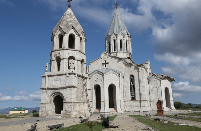   view shows Ghazanchetsots Cathedral damaged by recent shelling during a military conflict over the breakaway region of Nagorno-Karabakh, in Shushi (Shusha) October 8, 2020. (photo credit: Vahram Baghdasaryan/Photolure via REUTERS)